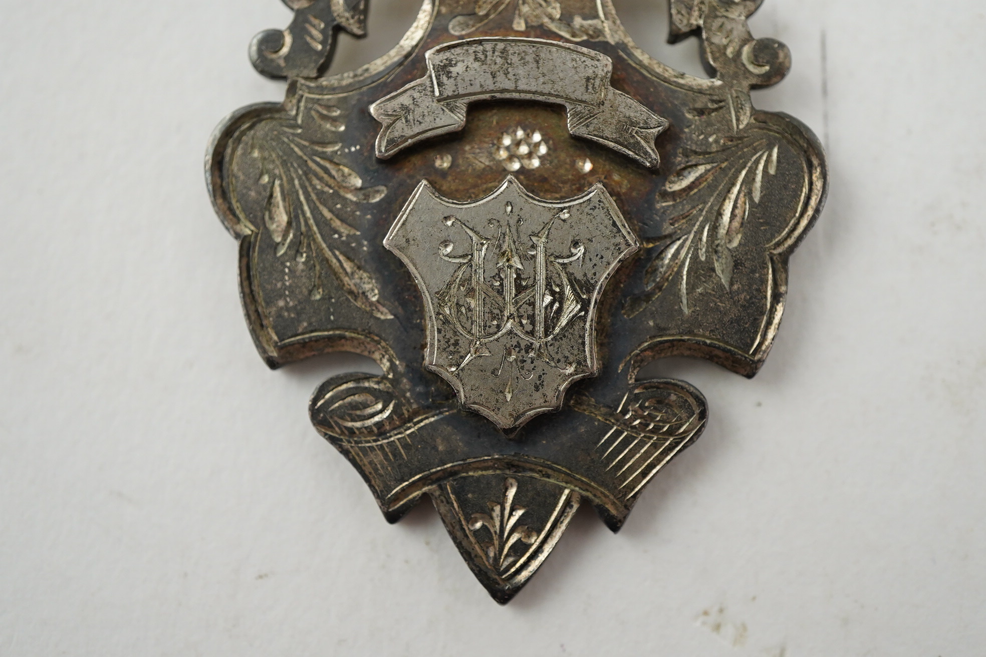 Aston Villa Football Club interest :, a late Victorian silver football medal, inscribed 'B & D.F.L. Championship, Aston Villa F.C. Runners Up 1897/98, W. Hagart [sic]', makers S.A.M., Birmingham, 1897, 44mm, in case of i